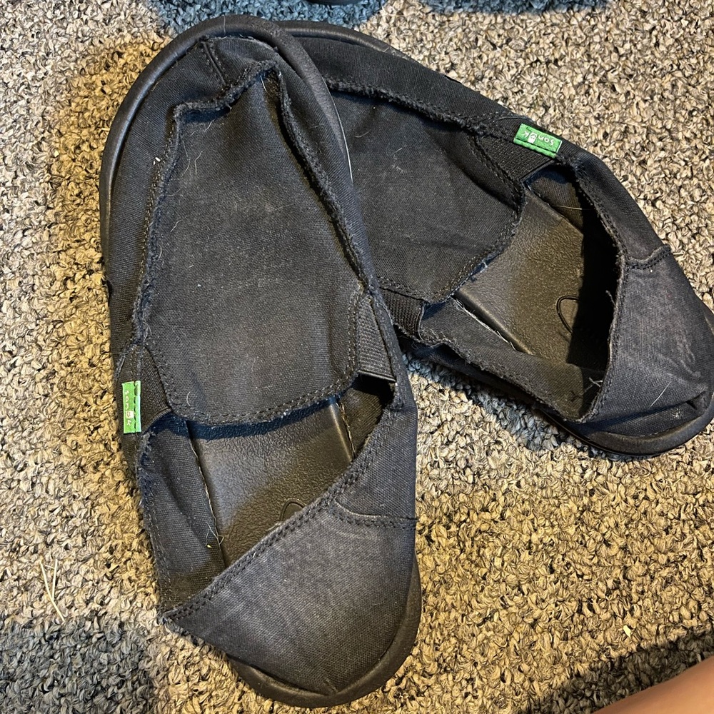 Slip on Sanuks. Never worn size 5